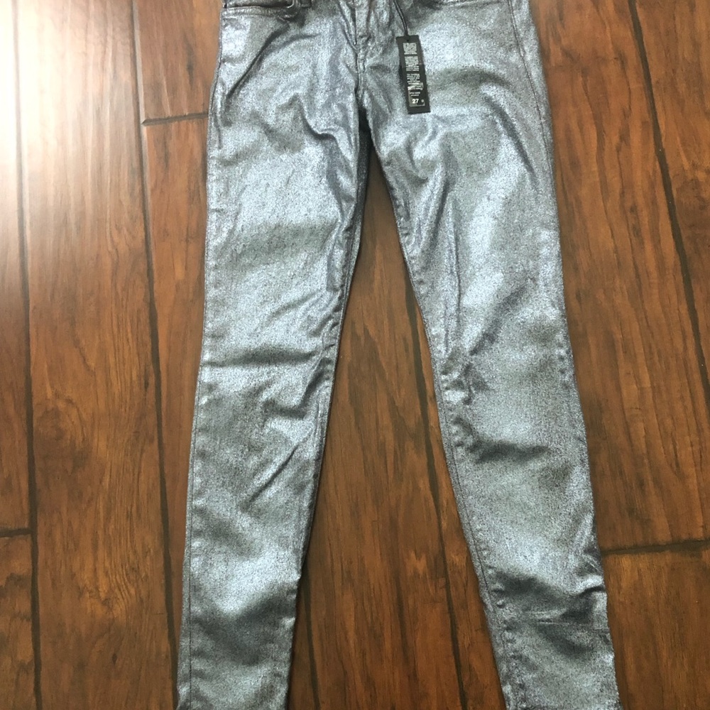 Metallic silver edgy skinny jeans.
